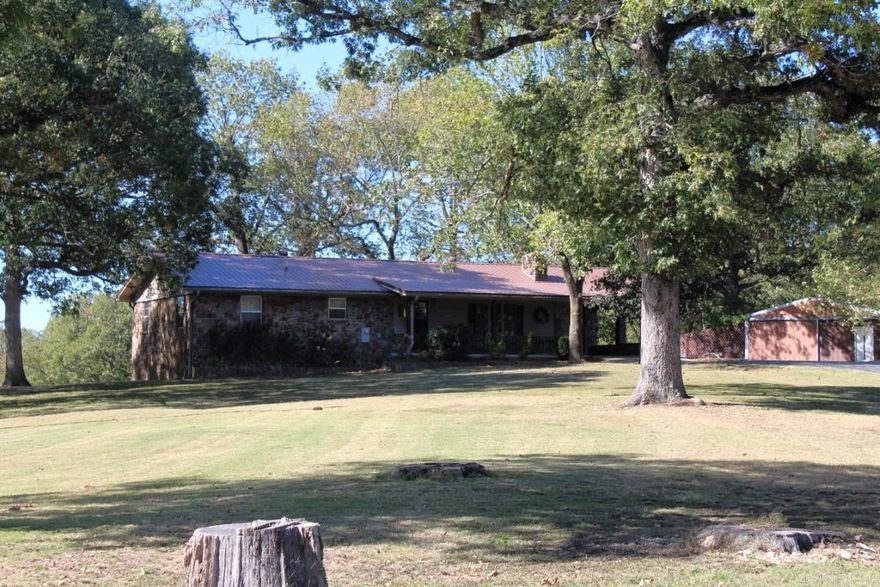 No. 02392 HOME AND 17 ACRES INSIDE THE CITY LIMITS OF MOUNTAIN VIEW, ARKANSAS. A paved driveway leads to a knoll with a 3 bedroom, 2 bath home that has 1680 sq ft of finished space and 728 sq ft of unfinished basement.  Large shade trees add to this picturesque setting.  You can be downtown in 5 minutes and still feel as if you are out in the country.  You are 5 miles from the White River for summertime fun, and an approximate 10 miles to the road leading to Blanchard Springs Cavern an Recreation Area in the Ozark National Forest, and 3 minutes to the Ozark Folk Center State Park. Use this property as your own personal mini farm or take advantage of the ideal location for a commercial venture.  There is an old barn on the West edge of the property that joins city property and a workshop/garage with open bay storage near the home.  The home has an attached carport, new roof, and has been lovingly maintained by the owners and their family before them.  So much can be said about this property that simply will not fit in the space allowed for an ad.   Call today to learn more!  $290,000