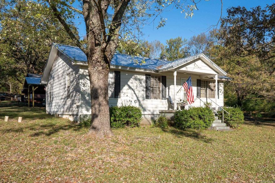 Very cute, well maintained home on 6 acres convenient to everything you need. Large shop with electric and water. Two other out buildins, barn and dry storm shelter. Must see to appeciate all this home has to offer.  New roof, HVAC,dishwasher,sink