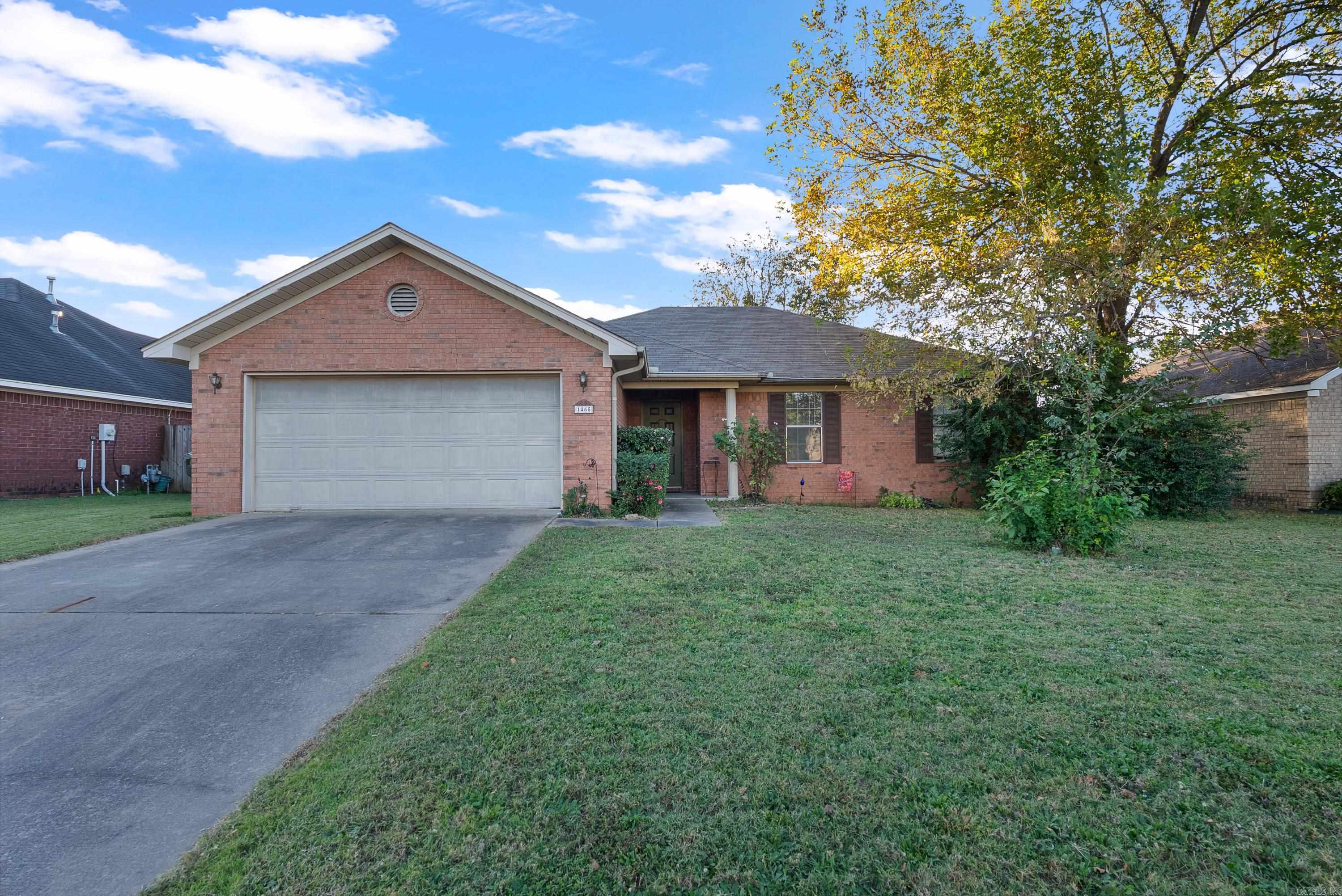 Home is located off South Donaghey off Farve Lane, close to Ellen Smith School and UCA. Enjoy beautiful camellias lining the sidewalk to your front porch. You'll love the fresh paint inside, vaulted ceiling in the living room, and lots of natural light in the whole house. The primary suite has space for a king-size bed and still feels roomy. One of the favorite things about the property is the covered back patio and fenced in yard for pets and kids. Don't miss out on this affordable home in one of Conway's great subdivisions.