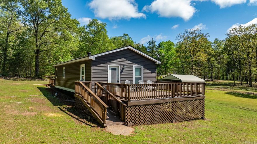 Welcome to the market 1381 HWY 330 in Choctaw!!  2 Bed, 1.5 Bath Home on approximately 3.04 Acres Near Greers Ferry Lake This home has about 814 square feet of living space and sits on 3.04+/- acres (see survey). It includes a large 24x35 carport and an RV hookup already in place. This property has no restrictions and move in ready!! All the work has been done for you!  Located about 2.7 miles from Choctaw Marina and approximately 0.3 miles from Greers Ferry Lake, it's a great spot for a full-time home, rental, or weekend getaway.   Plenty of space to build another cabin or bring your ideas to life!