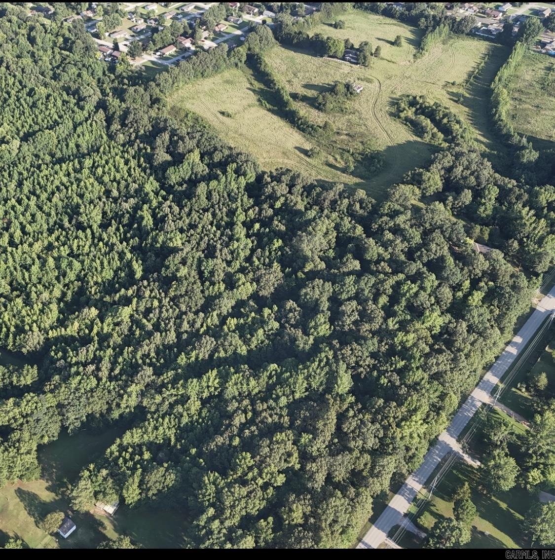 17 Acres on North Rockingchair Road. Prime property in a desirable location with multiple possibilities. In city limits on westside of Paragould. City utilities available .