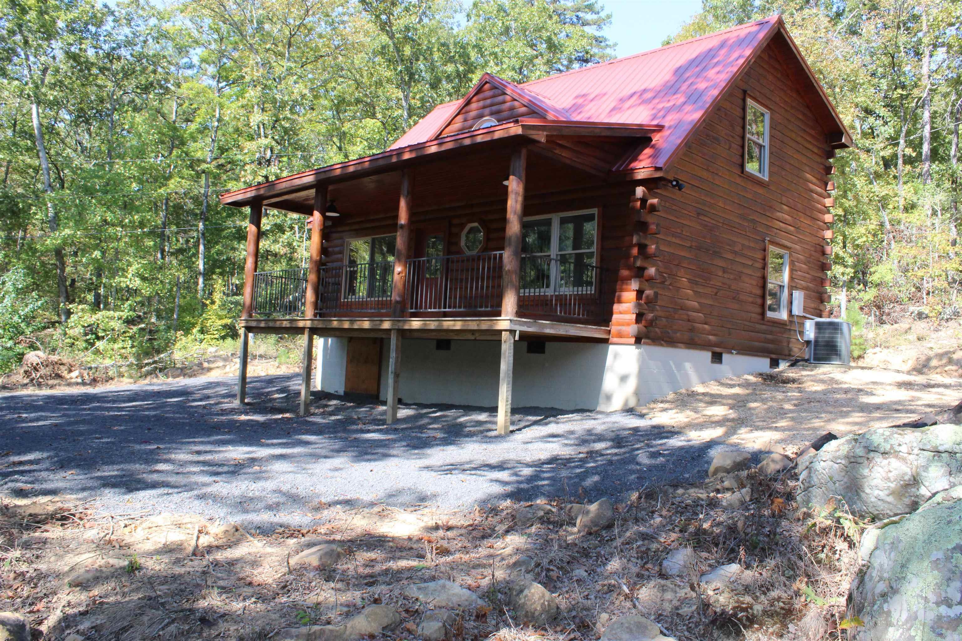COZY LOG CABIN!!! Escape to this cozy log cabin nestled on 20+/- acres of pristine recreational timberland, perfect for hunting enthusiasts and nature lovers alike. Overlooking the Middle Fork of the Little Red River, this tranquil retreat offers a peaceful setting in the heart of the Ozark Mountains. Enjoy the numerous rock features scattered throughout the property. Inside, youāll find a warm and inviting atmosphere, ideal for unwinding after a day of adventure. With fiber internet, you can stay connected while enjoying the serenity of rural life. With wildlife consisting of whitetail deer, bear, turkey, and numerous small game animals makes this property a haven for avid hunters. Nearby is the Buffalo National River where you can enjoy kayaking, canoeing, fishing, and numerous other outdoor activities. 13 miles to Marshall, AR, where you can gather your day-to-day supplies. With electric and septic behind the cabin already in place this area would offer ample space for another dwelling or shop. Whether you are looking for a weekend getaway or that forever home this could be just what you have been looking for. All Furnishings convey at no monetary value. Don't miss out!!!!