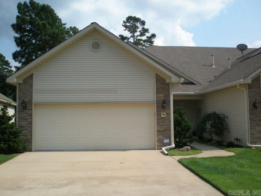 Updated & move-in ready. 4 bedrooms, 3 full baths, open floor plan, den, master, en-suite guest and laundry on main level. Huge rooms, gas log fireplace, oversized dining and breakfast bar, stainless steel appliances, slab granite counter tops, composite deck and concrete patio over-look green belt, site built hardwood flooring, tons of light from wall of windows off den and kitchen, man-cave / shop in unfinished crawl space. This one is loaded with custom features and priced to sell!