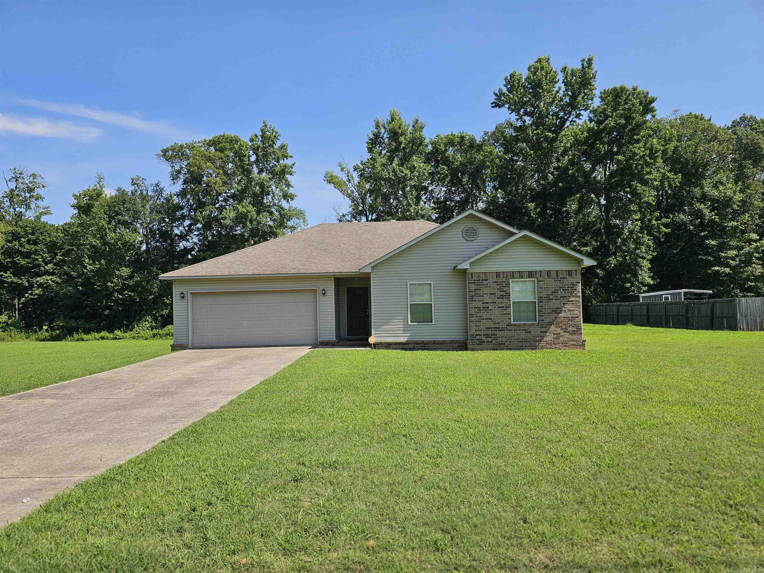 This freshly painted 3 Bedroom 2 Bath home is sitting on over an acre in a peaceful Neiborhood. It's close to town but still has the country atmosphere. This home is ready for you to move in and enjoy.