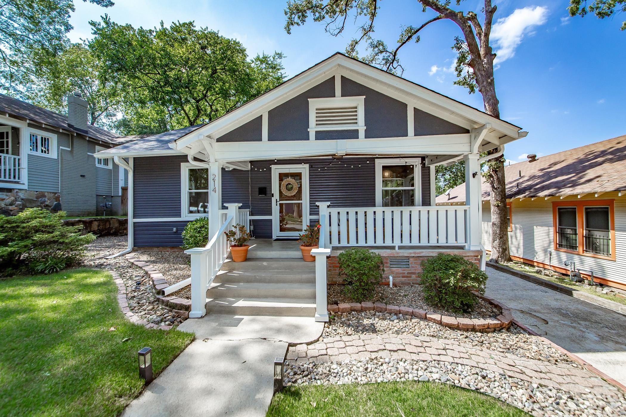 Step inside this thoughtfully renovated bungalow, where classic Hillcrest character meets the conveniences of modern living. Offering 2 bedrooms plus a dedicated office, this home strikes the perfect balance of style and functionality. The open-concept living & dining areas create an inviting space for everyday living and entertaining. The kitchen is a showstopper, featuring quartz countertops with a waterfall edge, stainless steel appliances, custom cabinetry with abundant storage, and a breakfast bar for casual dining. Both bedrooms are generously sized with great natural light and ample closet space. The guest room includes a custom Murphy bed, making it a versatile flex space. Bathrooms have been thoughtfully updated with contemporary finishes—highlighted by a soaking tub in the main bath and a sleek ensuite with a rainfall walk-in shower. Outside, the detached garage with front and alley access adds convenience, while the fully fenced backyard offers privacy and a serene setting for gardening, pets, or entertaining. Major updates include roof, windows, & tankless water heater (2020) and HVAC (2022). Schedule your private showing today! Agents, please see remarks.