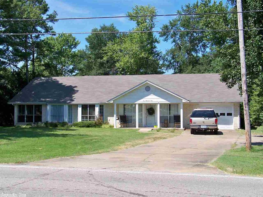 This 3BR 2.5BA house sits on two lots that ar C4 zoned. Living room is very large. There is a separate dining, lots of kitchen cabinets, large laundry with utility sink and cabinets, sunroom, large master with huge walk in closet, master bath has separate vanity rooms. There is a covered back porch that is shaded by mature trees & over looks a large lot that is perfect for garden or place to play. 2 water heaters. 2 ht/air units. This house is walking distance to groceries & Elem. school. New roof!!
