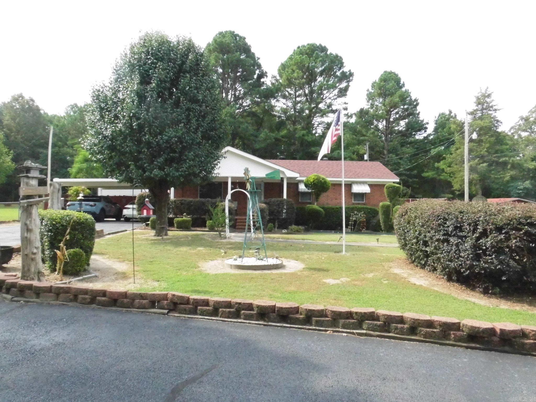 **Brick home with spectacular landscaping and outdoor entertaining area**2 car carport**Completely fenced yard**Inground Pool with diving board and slide**In- ground storm shelter**Covered back porch**2 Shop buildings, 2 storage containers **Interior of home features updated kitchen, updated bathroom, updated flooring, and 3 bedrooms**Way to much to list so call today to schedule a showing**Located in the heart of East End**Less than 5 minutes to schools, grocery store, pharmacy, banks and churches**You gotta come see this great property**