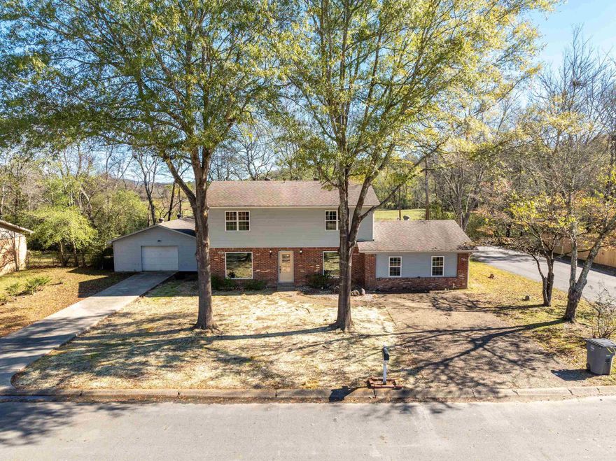 Stunning Completely Remodeled 2-Story Home with 5 Bedrooms & 3.5 Baths. Welcome to this beautifully updated, move-in ready home, nestled on a corner lot and backing up to a serene meadow. This spacious 2-story home boasts 5 generously-sized bedrooms and 3.5 modern baths, including 2 master suites, offering flexible living options perfect for multigenerational households or guests. Inside, you'll find modern fixtures and finishes throughout, highlighted by luxury vinyl plank flooring, adding both elegance and durability to every room. The kitchen features gleaming granite countertops, sleek cabinetry, and stainless steel appliances, ideal for culinary enthusiasts and entertaining alike. The two master suites provide an unparalleled retreat, each offering its own private bathroom with high-end finishes. Additional bedrooms are spacious, with plenty of natural light. The home also includes a detached shop/garage with ample space for projects or storage. Outside, enjoy peaceful views of the meadow. This remodeled gem offers the perfect blend of style, comfort, and functionality, all in an exceptional location. Don’t miss out on the opportunity to make this dream home yours!
