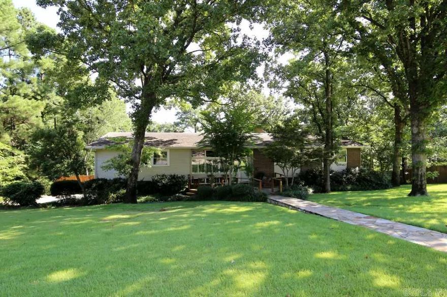 Wonderful family home on half-acre lot w/all the updates! Formal LR, formal DR, den w/WBFP, wonderful remodeled eat-in kitchen, master w/ his & her updated baths, 2 add'l. BRs & remodeled hall bath - all on the main level. Downstairs features a den w/2nd FP, guest BR w/ensuite remodeled bath, office, half bath, & lots of storage! The crown jewel is the sparkling blue, inground pool situated against a backdrop of trees & green space for ultimate privacy. A great Robinwood home!