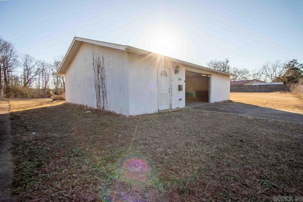 Fantastic investment opportunity! This unique property features a 1,072 sq. ft. concrete block building and a 1,040 sq. ft. frame building, both packed with potential for creative uses. Situated on 0.51 acres made up of three lots, the property offers ample space to develop or repurpose to suit your needs. Located just outside the city limits of Sherwood, this property is surrounded by multi-family duplexes, making it an excellent option for investors looking to tap into the area's rental or redevelopment potential. With its prime location and versatile buildings, this property is ready for your vision. Donāt miss outāopportunities like this are rare!