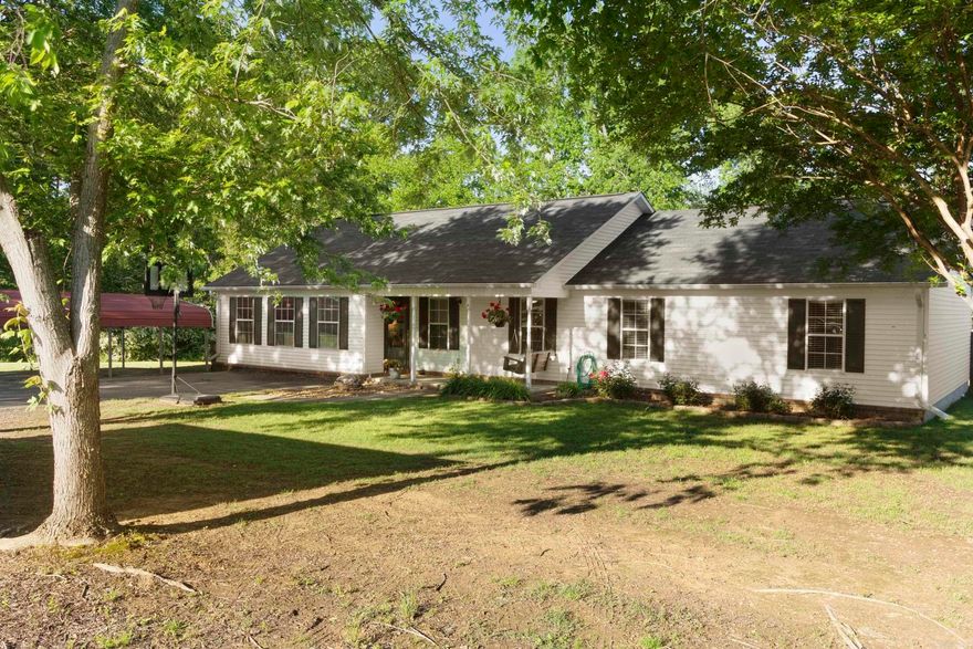 Step into this captivating 4-bedroom, 3-bathroom gem tucked away in the heart of Searcy, where charm and character abound at every corner. This inviting atmosphere will make you feel right at home! On one end of the home, there are three bedrooms and two full bathrooms providing ample space for functionality. (Technically, 2 master suites in home) On the other end of the home, there is a newly renovated primary suite ensuring privacy and conveniently located to the large laundry area. Lots of storage closets throughout. The cozy kitchen offers a generous amount of cabinet space and a pantry. The dining area is perfect for enjoying meals with family and making memories.  All appliances in kitchen and washer/dryer stay with the home. Trampoline and shed stays in backyard.  Two carports out front for covered parking. Newer fence in backyard. Newer gutters! Roof- 8-10 years old. HVAC- less than 5 years old. Outside, the expansive backyard provides a private oasis for outdoor activities and enjoyment, offering plenty of space for gardening, entertaining, or simply soaking up the sunshine. Imagine hosting a summer BBQ with friends or unwinding with a book on the back deck. So lovely...