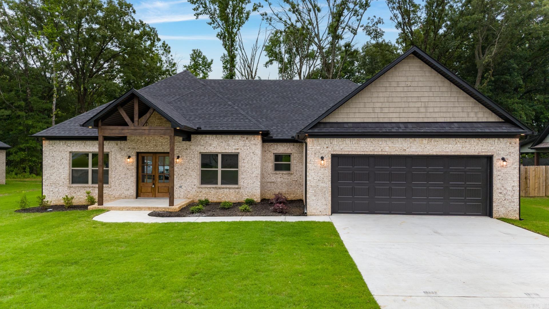 Beautiful new construction home in Hidden Valley Estates with 2.5 bathrooms! Hardwood look tile, granite/quartz countertops, beautiful custom cabinets, stainless steel appliances, custom trim, custom tiled shower with custom glass door, HUGE pantry, good sized primary closet, stand alone soaker tub, large covered back porch, soffit/eave can lights, oversized garage and one of the bigger back porches you will ever see on a house this size! Purchase now and customize your selections today!