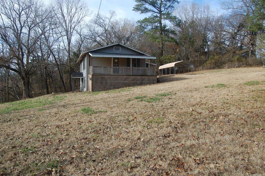 Fall in love with this country property that is sitting on 2.60 Acres M/l and bordering Clear Creek! You will find a detached two car carport, covered front deck and some amazing views! Seasonal views of the creek from the deck and living room window. On the main level you will find two bedrooms and one full bathroom, a spacious living room and a charming kitchen! In the basement you will find an open family room and a laundry room with half bath! Hurry, before this one gets away!