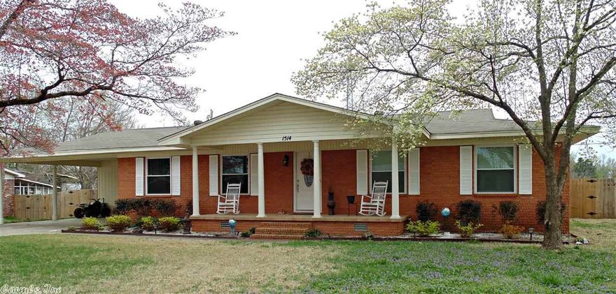 UNBELIEVABLY BEAUTIFUL!!  Everything has been remodeled in this home.  3 bedrooms and bath separate from Master suite.  Upgraded kitchen with all appliances included (includes french door fridge).  Oversize laundry room. real hardwood floors, great room, the room flows with ease.  Master suite has sitting room with fireplace and oversize closets and exit to back yard and covered patio.  fresh interior paints all in great location.  Close to I-30 and shopping areas. Island in kitchen does not convey w/home