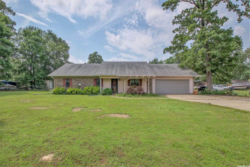 Check out this 3bedroom 2 bath home situated on just under 1/2 an acre with a fully fenced backyard, covered deck, beautiful front porch and lots of space for entertaining. The oversized garage has extra storage and a workspace. The primary suite has a large walk-in shower with sliding glass doors and tile. Contact Michael to schedule your private tour.