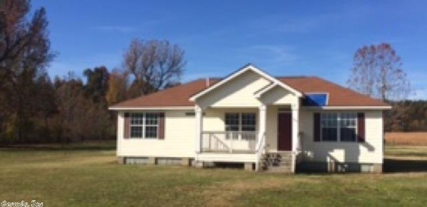 Located on an acre lot in rural country side, this 2 bedroom/2 bath home has much to offer. The vinyl siding ensures low maintenance and the front porch and back patio ensures lots of room to relax and enjoy the beauties of nature.  The open floor plan offers a great living room, master bath with double vanities and walk in shower, separate laundry room, separate breakfast room, breakfast bar and plenty of room in the kitchen. Needs some repairs but a little TLC will go a long way. SHOW TODAY!