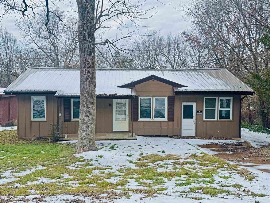 Welcome to 6 Arrowhead Drive in Cherokee Village, Arkansas -- a spacious two-bedroom, one-bath home offering strong potential for those looking to invest, renovate, or expand their rental portfolio. This property features an exceptionally large bonus room that could easily function as a third bedroom, all while maintaining dedicated living and dining rooms and a generously sized kitchen. A newer metal roof provides a solid start for future improvements.  While this home does need updates and repairs, the layout, square footage, and location make it an excellent opportunity for a flip project or long-term rental. With vision and care, 6 Arrowhead Drive can become a valuable addition to any investment strategy.