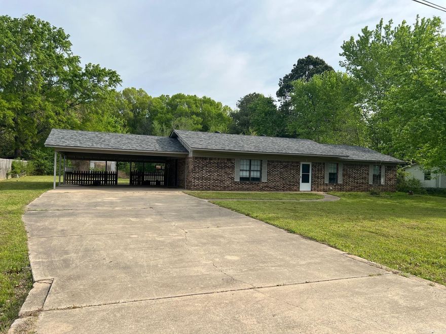 Three Bedroom Two bath home on 1 acre.  Lvp Flooring throughout. Fresh Paint Has a shop building in the back yard. Carport.