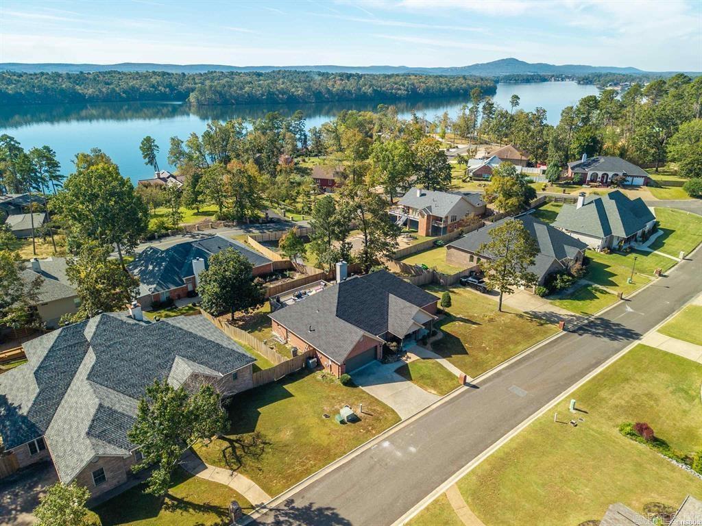 Welcome Home to Starboard Circle! This home is in pristine condition with many updates and is ready for a new family to love. Boasting 4 bedrooms, including 2 with a Jack & Jill bathroom and 3 full bathrooms. The large primary bedroom is warm and welcoming with its own bathroom oasis offering a jetted tub and separate shower, dual sink vanity and large walk in closet. Enter into a welcoming, open floor plan perfect for the whole family. The entire space is designed for easy movement and interaction. This allows family members to stay connected while going about their various activities. Mom might be cooking dinner while chatting with the kids about their day, and the children can still be involved in the conversation or even help with meal prep, creating a shared sense of togetherness. Off the kitchen is an office/study area for an additional retreat space. The outdoor patio blends comfort, style, and relaxation, with a cozy fire pit and comfy seating, it is perfect for gathering with friends, roasting marshmallows, or sipping wine beneath the stars. The flames cast a warm, golden light that dances across the space, creating an inviting and peaceful atmosphere. See Agent Remarks