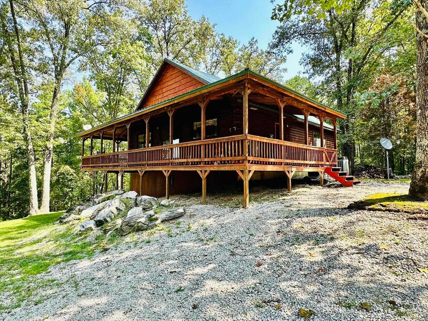 40 ACRE LOG HOME WITH 40 ACRES ON MILLCREEK  Nestled on 40 +/- sprawling acres, this property is surrounded by the breathtaking beauty of the Ozarks, with panoramic views that are nothing short of spectacular.  A year-round spring-fed creek runs through the land, providing a serene backdrop and a reliable water source. The land is fenced and ready for livestock, making it ideal for a working farm or a peaceful country retreat. Wildlife abounds, offering a haven for nature lovers and outdoor enthusiasts.  This 4-bedroom, 2-bathroom log home offers 2,176 square feet of cozy living space, including a finished basement. The rich wood finishes throughout the home add warmth and charm, creating an inviting atmosphere. Whether you're looking to escape the hustle and bustle of city life or seeking a place to cultivate your agricultural dreams, this property is a rare find that combines natural beauty, functionality, and the timeless appeal of log home living. All listed for $395,000.