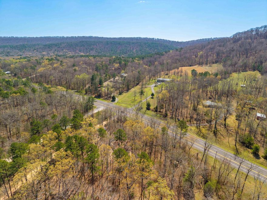 Newly Renovated 3-Bed/3-Bath Creek-Side Retreat  Location is everything! This newly renovated 3-bed, 3-bath home on a partially wooded 0.5+ acre lot perfectly balances nature with convenience. Situated directly on Highway 270, you get effortless access to all of Mount Ida's amenities without sacrificing the outdoor lifestyle.  What makes this home truly unique is its unmatched proximity to adventure. It is literally the closest property to Hickory Nut Mountain Road, putting scenic vistas and the Lake Ouachita Vista Trail (LOViT) right at your doorstep. You are also just minutes from prime Lake Ouachita access via the Joplin Use Area (~3.5 miles) and Crystal Springs (~5.5 miles).  The smart layout offers great separation of space:  Upstairs: A bright living room, formal dining room, and 2 bedrooms.  Downstairs: A 2nd living area anchored by a cozy fireplace, plus the 3rd bedroom.  Outside: A beautiful patio directly overlooking a tranquil creek.  This is the ultimate, move-in-ready basecamp for lake and mountain living!