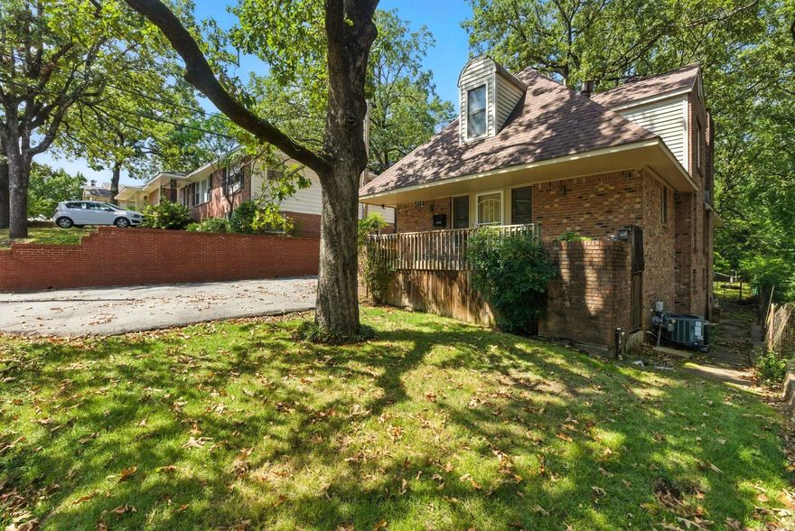 Located in Little Rock's beloved Hillcrest neighborhood, this four bedroom home is brimming with potential.  The thoughtful layout includes the primary suite on the main level, a large half bathroom for guests, laundry room with shelving and countertop space, combined living and dining area, as well as interior access to the basement/workshop.  Upstairs has a flexible layout--two bedrooms and a bonus room, or use as three bedrooms. The large hallway bathroom fills with natural sunlight and showcases an adorable window seat. It is ready for a cosmetic refresh, and has been lovingly cared for over the years.  Located within walking distance to Holy Souls and Forest Heights STEM, with favorite Hillcrest shops and dining nearby too! Kitchen refrigerator conveys. Agents, see remarks.