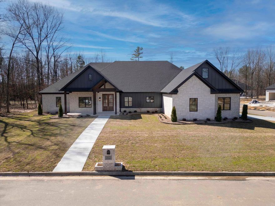 Tucked inside the private gates of scenic Devoe Bend, this NEW CONSTRUCTION gem sits proudly on a large corner lot with serene green space behind and White Oak Bayou just steps away. Thoughtfully designed, this home features 3 spacious bedrooms—each with its own private bath and walk-in closet, plus a stylish powder bath for guests. A generous flex space offers endless options: playroom, home gym, media room—you name it! You’ll also love the dedicated home office and the laundry room with built-in cabinets and sink for peak functionality. The main living area boasts a cozy electric fireplace, sleek lit cabinets, and an open layout perfect for gathering. Need storage? There’s plenty—including stair access to the attic. Relax on either the covered front or back patio, ideal for morning coffee or evening wind-downs. Living in Devoe Bend means embracing the outdoors, with access to kayak and canoe launches, peaceful nature trails, two ponds, and a fire pit area—a true retreat just outside your door!
