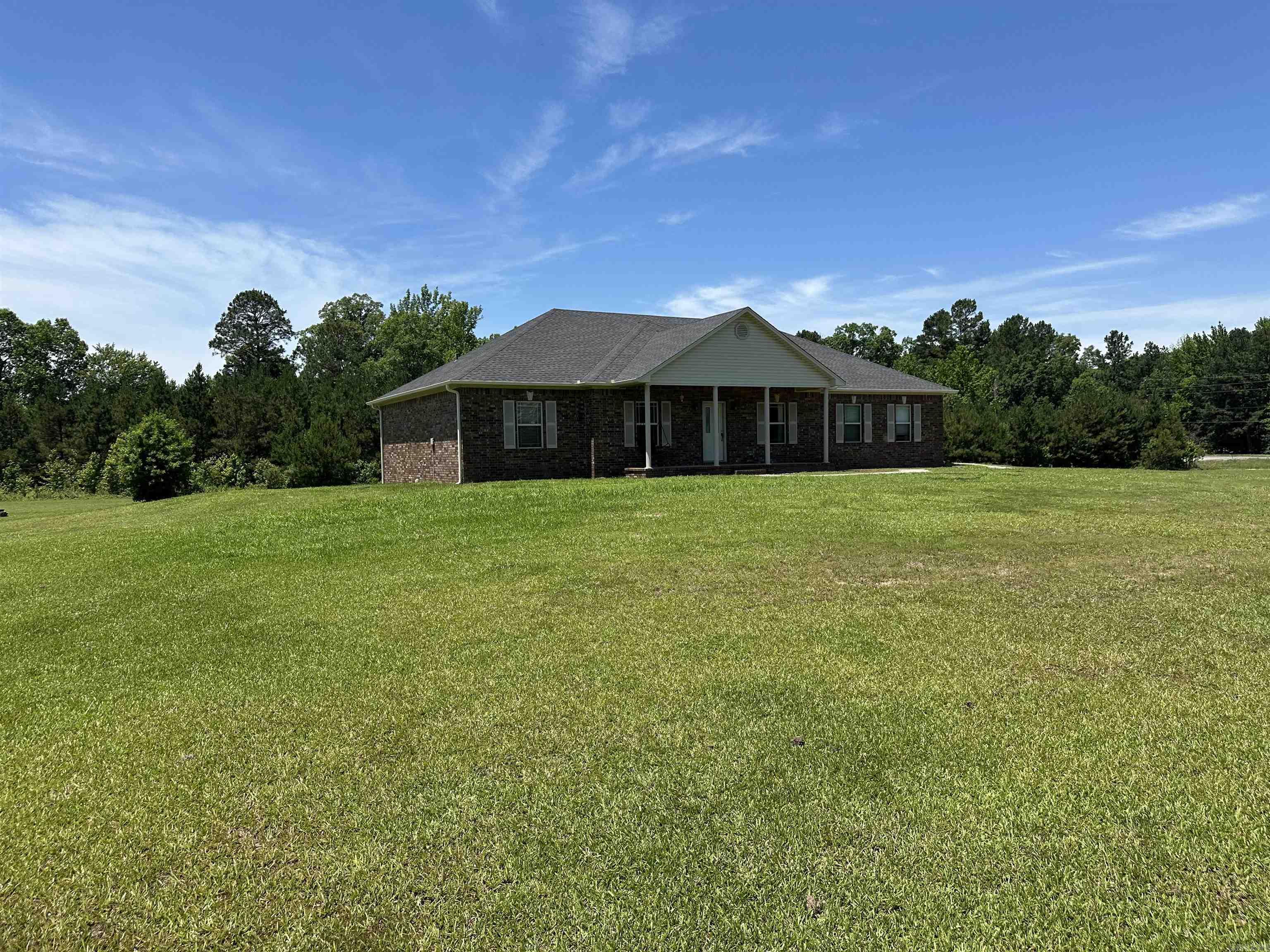 LARGE 4 BEDROOM HOME ON 3.56 ACRES, THIS HOME WAS A CUSTOM-BUILT HOME AND HAS A LOT OF EXTRA FEATURES, CROWN MOLDINGS THROUGHOUT, 2 CAR GARAGE, DINNING ROOM, TRAYED CELINGS, REAL HARDWOOD FLOORS, SPLIT FLOOR PLAN WITH MASTER AND ALL BEDROOMS APART.