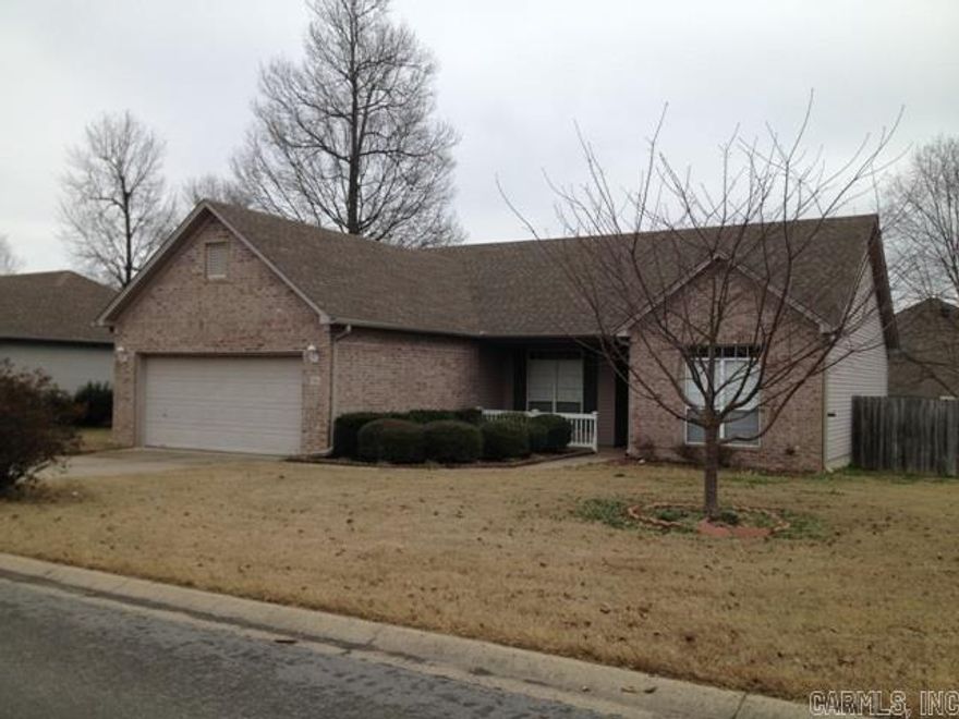 Impressive home with 9' ceilings & many cosmetic updates including lighting, plumbing fixtures, paint and floor coverings. Spacious living area with fireplace and large master with walk-in closets. 2 additional bedrooms are separate.   Two car garage, lovely landscaping and fenced backyard with deck!  Credit report acceptable to owner is required. Deposit required. TO SHOW CALL LISTING AGENT:  501-831-1559