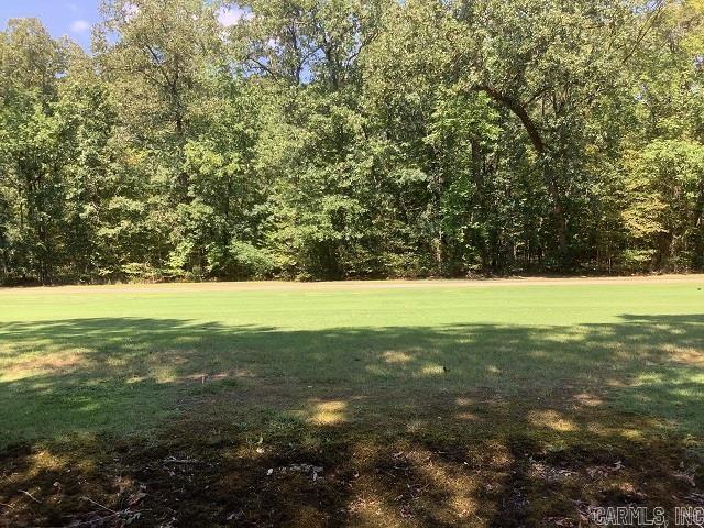 Over 300' on the golf course (just under one acre) 2 lots combined into one with gorgeous views on the 5th hole! Located in Diamondhead Resort Community. It is a private community only a few minutes from downtown Hot Springs. Community includes a PGA sanctioned 18-hole golf course, Olympic size pool, children's playground, tennis, basketball & pickleball courts, restaurant, library and workout room. Lake Catherine State park is 1 mile away with hiking trails & waterfalls. YOUR GONNA LOVE IT HERE.