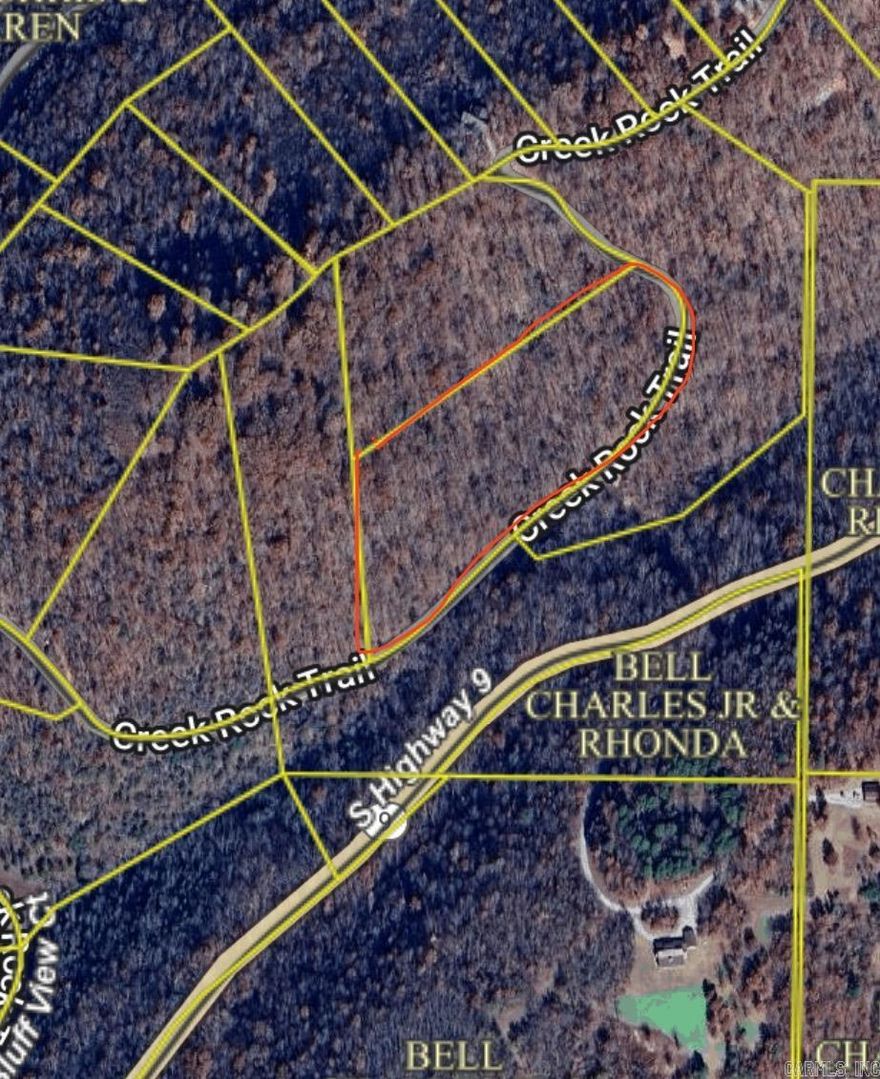 Spacious 5.7 acre wooded parcel with several possible building spots in a lovely gated subdivision. Location is convenient to the White River and Mountain View. There are a few restrictions to protect your investment including a 1200 sq ft minimum.