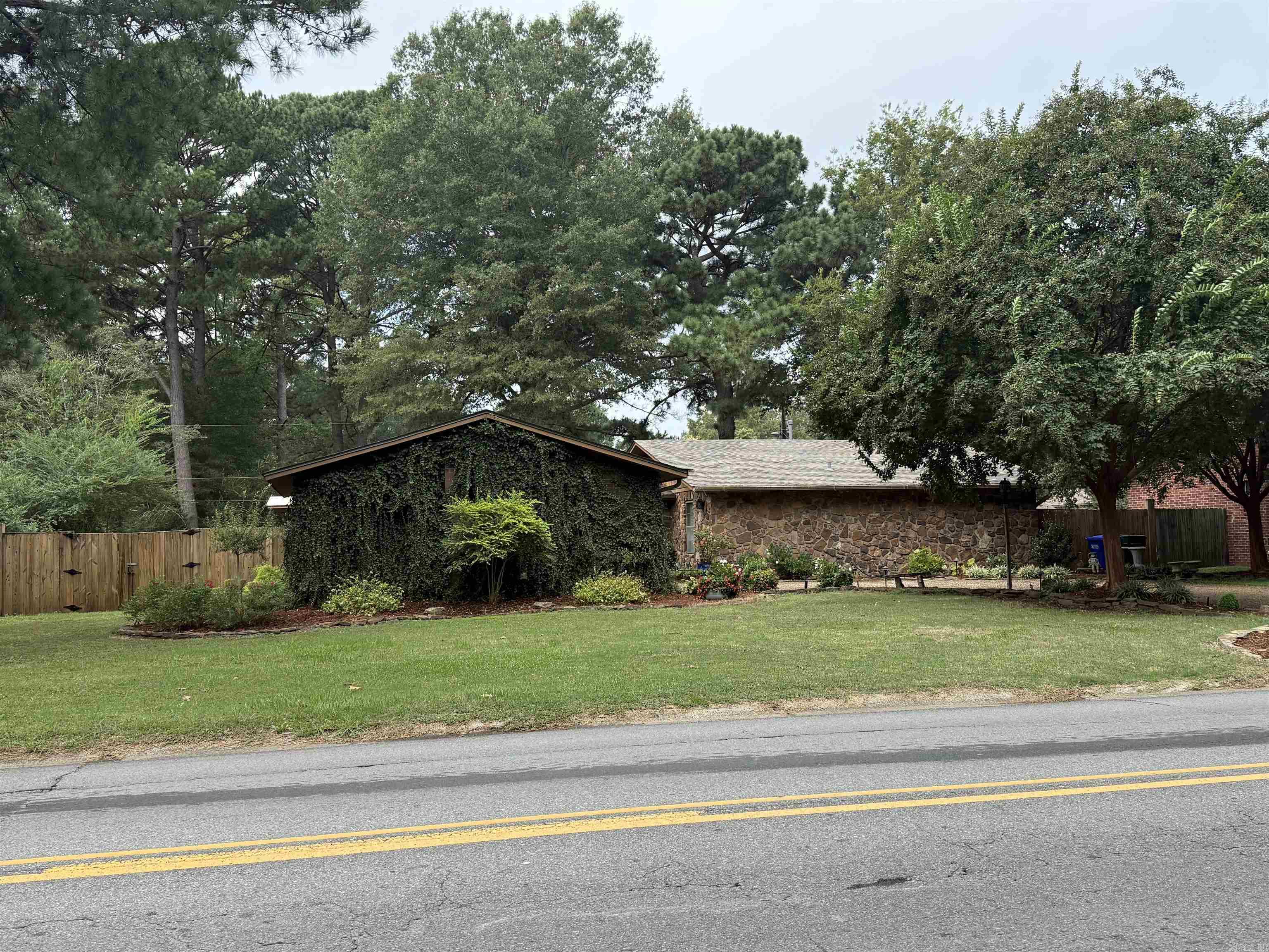 Beautifully remodeled 2292 square foot home on 0.34 acres with 4 bedrooms and 2 baths and office. New roof in 2024, New 40-gallon gas water heater 2025, new stove, new dishwasher, custom-sized fridge conveys. 4th bedroom has its own exterior doors and hvac split unit. Easy access to shopping and I-40. Gas Dryer hookup. Extra Landscaping!