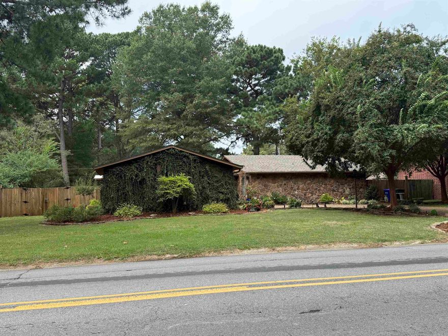 Beautifully remodeled 2292 square foot home on 0.34 acres with 4 bedrooms and 2 baths and office. New roof in 2024, New 40-gallon gas water heater 2025, new stove, new dishwasher, custom-sized fridge conveys. 4th bedroom has its own exterior doors and hvac split unit. Easy access to shopping and I-40. Gas Dryer hookup. Extra Landscaping!