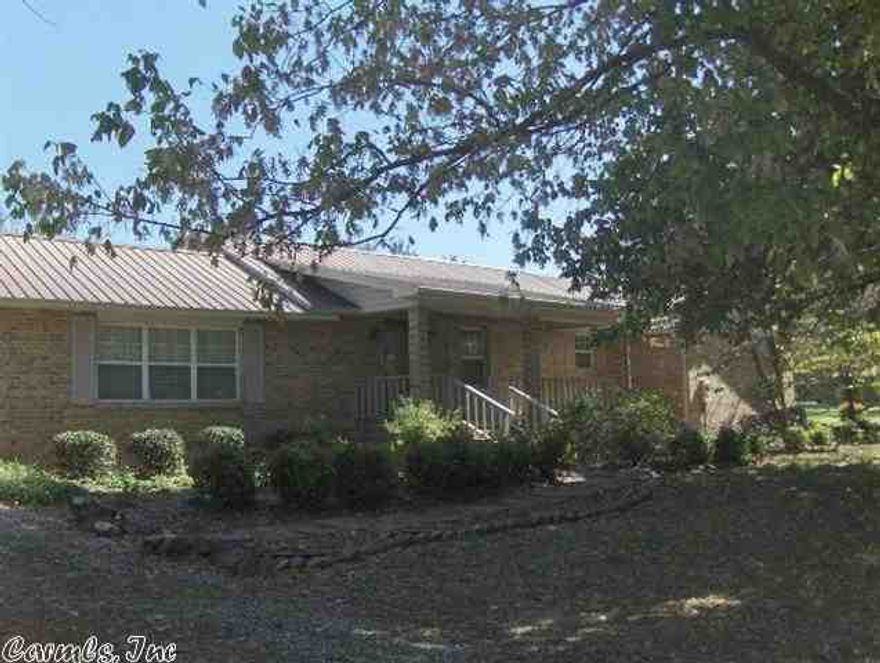 It has a two car carport along with a garage that could also be used as a shop. There is central gas heat as well as an outside central wood furnace for those chilly nights and a fireplace inside the home. It also has the perfect patio spot and large yard for outdoor entertaining or family barbeques. There is underground power to this home that helps out in those winter months and a large front porch for the summer.