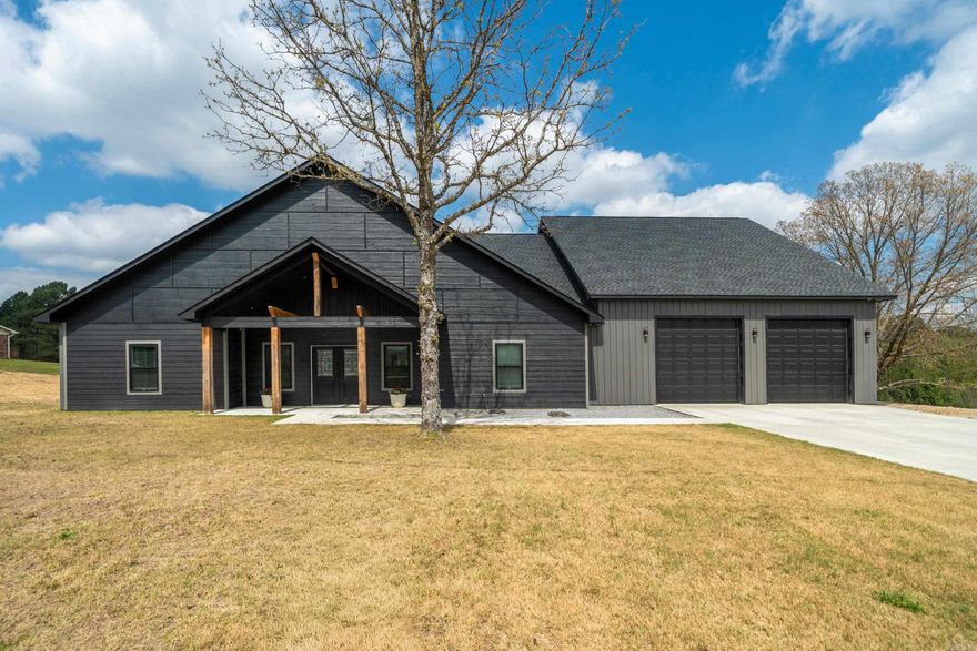 Stunning modern farmhouse on over an acre in the highly sought-after Lake Hamilton School District. This 3 bedroom, 3.5 bath home is packed with features you don’t want to miss—an outdoor kitchen perfect for entertaining, a versatile multifunctional room, and a fully finished space off the garage ideal for a home gym or bonus room. High end finishes such as quartz countertops, vaulted ceilings, large bedrooms, butlers pantry. This home also has 2 HVAC units. Plus, enjoy peace of mind with a Generac generator and oversized 10-foot garage doors for all your storage needs. Modern style, functional space, and room to breathe—this one truly has it all.