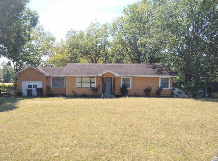 Rare find! House on .97 acres in the city convenient to everything! Investors look at this unique opportunity, flip, rental, unlimited possibilities. Please measure sq. ft. for accuracy.