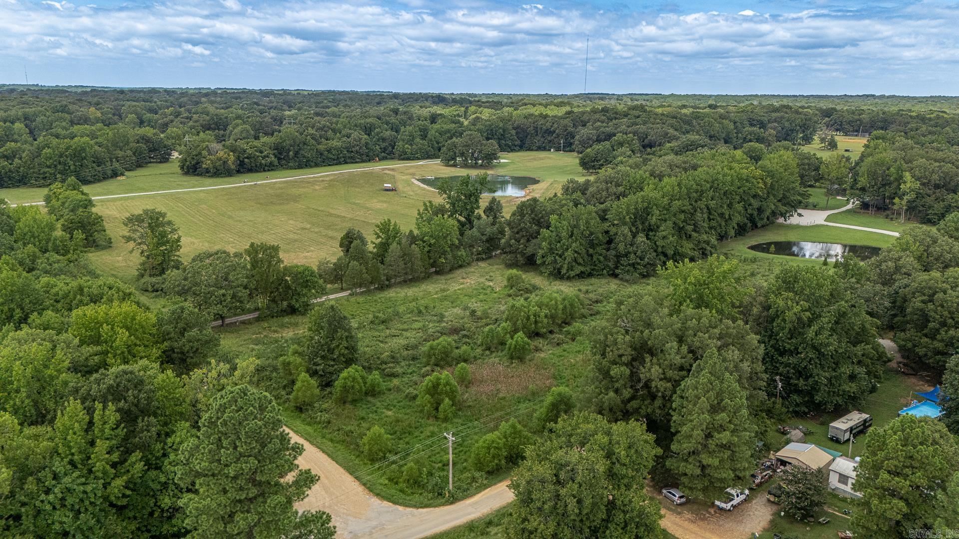 5+/- acres ready to build the perfect dream home. Water & Electricity is by the road and the property has been Perc tested in the past. Seller has receipt .Property is on the corner of CR 348 & CR 342