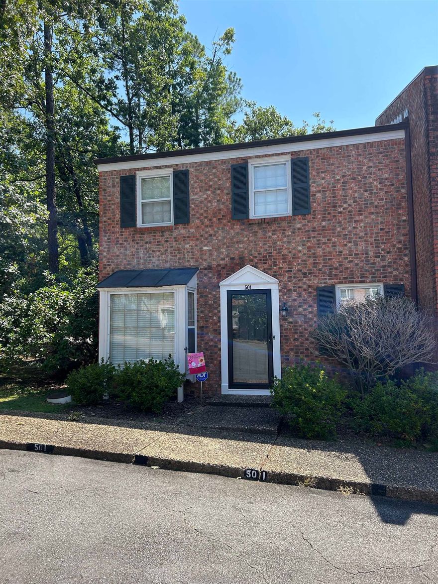 Sold before listed.  Absolutely adorable, well-maintained, updated and move in ready! New exterior paint and roofing just completed in fall 2022. This centrally located condo lives large. Granite countertops, open living + dining area, built in shelving, fireplace, spacious closets, and large outdoor patio. Oversized primary suite with an additional guest suite.  Enjoy the wooded walking trails, clubhouse and pool. Nearby shopping and restaurants that are just a short drive away.