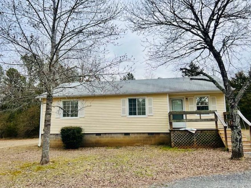 This 3-bedroom, 1.5 bath home is awaiting your vision with a ton of potential.  The home is located on almost 3.5 acres of beautiful, wooded property with an above ground pool, oversized covered deck and outdoor storage. Whether you're a DIY enthusiast or an investor, bring your contractor and imagination to this classic charmer.  Call today to schedule your showing. See agent remarks!!!