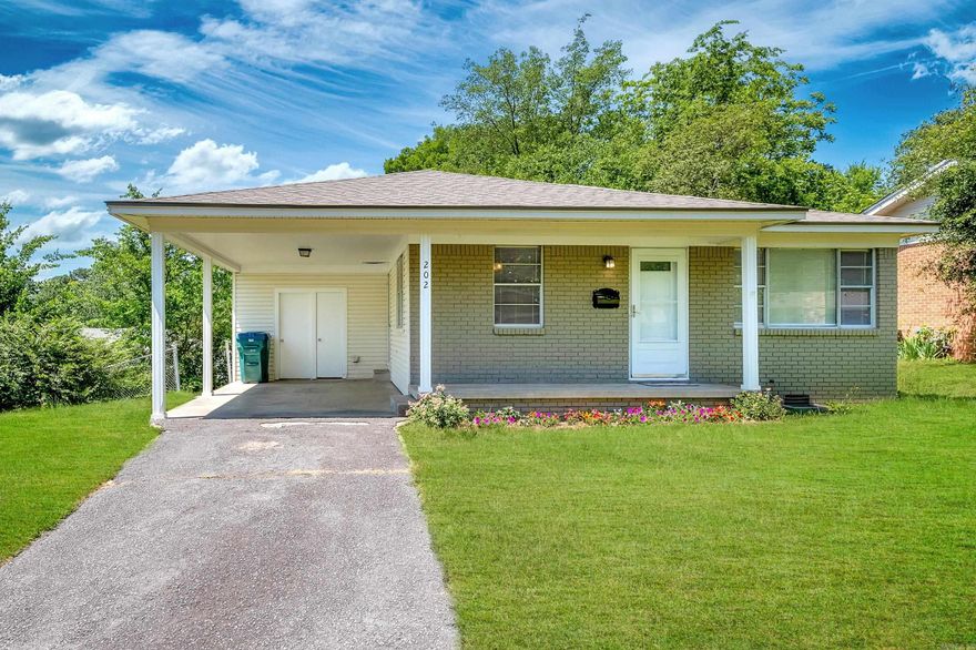 Adorable Updated Home on a Large Corner Lot!  This charming 3 bedroom, 1.5 bath home is full of fresh updates and ready for its next owner! Enjoy new flooring, interior paint, and lighting throughout, creating a clean and modern feel.  The kitchen shines with new countertops, a stylish tile backsplash, updated sink and plumbing fixtures, cabinet hardware, and a gas range—perfect for cooking and entertaining.  Additional upgrades include a new roof (2023), water heater (2019), and washer & dryer that convey with the home for added convenience.  Situated on a spacious corner lot, the property also features a 1-car carport and outdoor storage.  This move-in ready home has it all—style, comfort, and value. COME SEE!