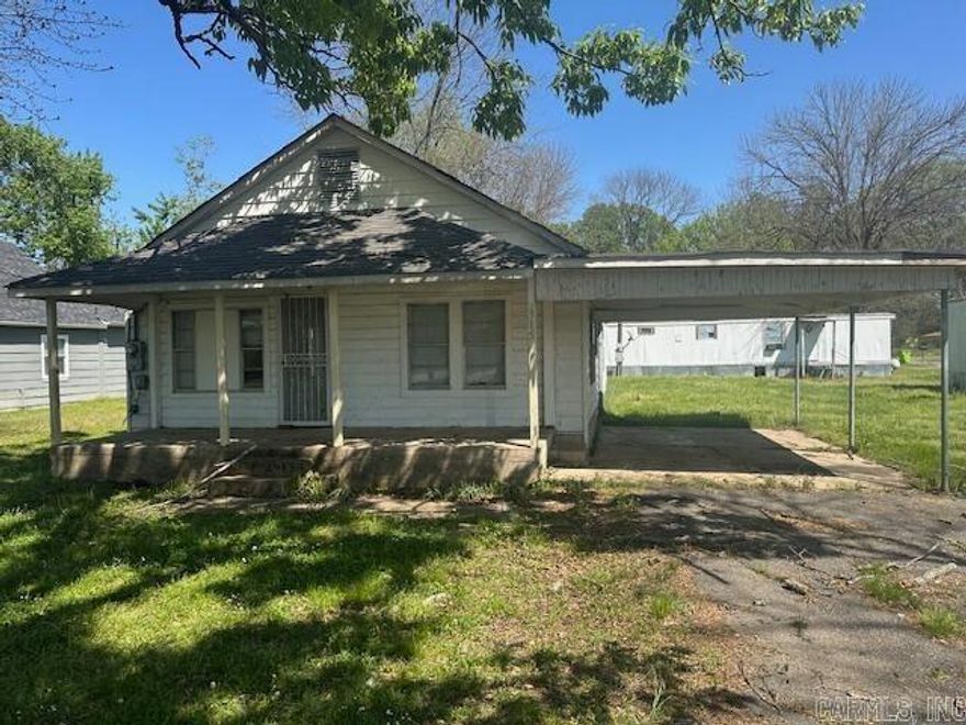 Great investment opportunity the house & 5 mobile homes! This property is being SOLD AS IS WHERE IS. The mobile homes are occupied, we don't have keys ~ 24 hour notice is required for showing.   It will be the buyer's responsibility to have utilities turned on for any inspections. Buyer will also be responsible for cleaning the house out. Additional properties are available, please give us a call for information.  ****See Agent Remarks for additional information****