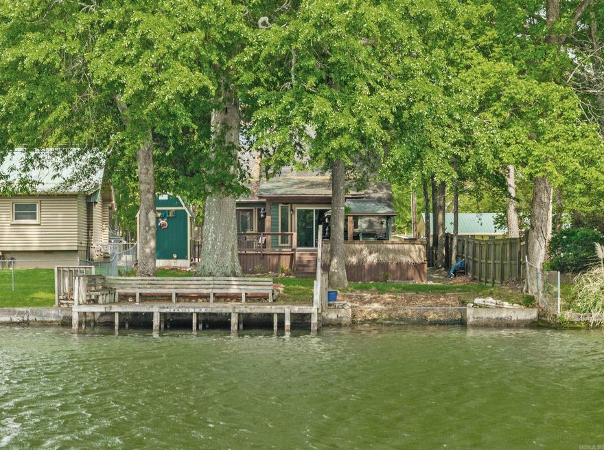 This Great Main Channel Bungalow packs a lot of punch! 3 Bedrooms, 2 full baths, a compact but well appointed kitchen with all the upgrades and a flat level lot to enjoy it all! The exterior includes a fabulous deck to enjoy watching the boaters, a hot tub to enjoy the evenings and a lakeside patio for year round fishing!