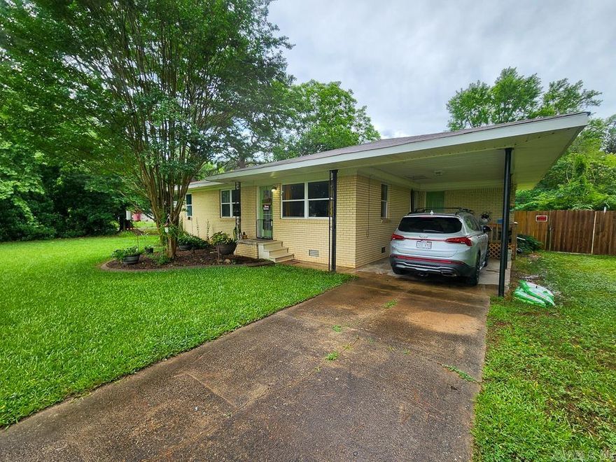 Welcome to 18 Cedar Street—a well-maintained 3-bedroom, 1-bath home full of character and modern touches. This 1,140 sqft home sits on a spacious 0.32-acre lot and features a large fenced-in backyard with a storage shed, perfect for outdoor living and extra storage.  Inside, you'll find original hardwood floors that bring warmth and charm, paired with updated windows that add energy efficiency and natural light. The kitchen includes kitchen appliances that are just 2 years old, and the refrigerator conveys with the sale.  Additional highlights include a single-car carport, low-maintenance exterior, and a 2-year-old roof—all the big-ticket items are already taken care of!  Whether you're looking for a cozy starter home or a smart investment in Greenbrier, this one is move-in ready and full of potential. Don't miss your chance—schedule your showing today!