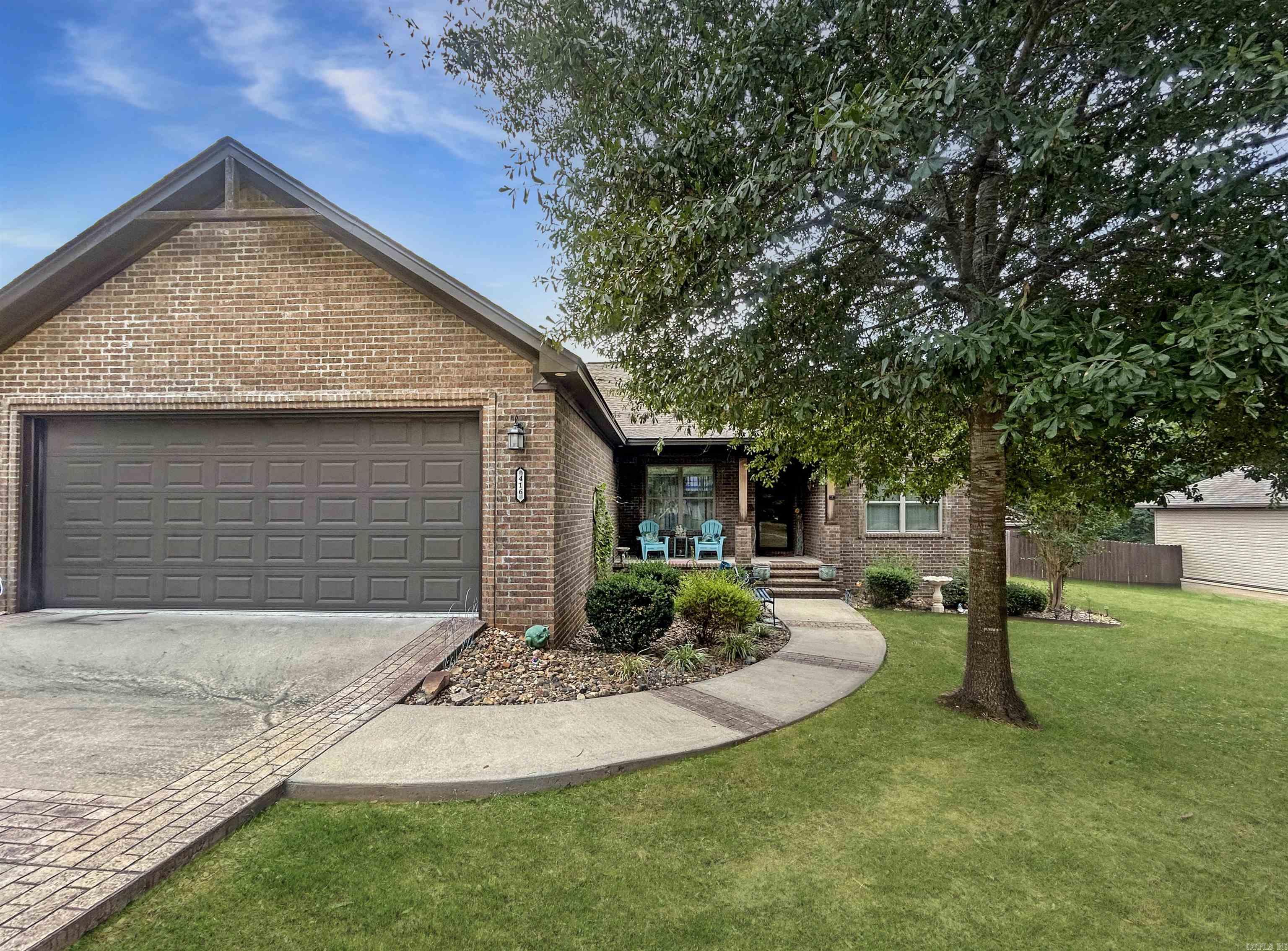 This 3 bedroom, 2 bath home is located on a quiet street in town. The fenced in back yard contains a huge storage building that conveys with the property. Engineered hardwood floors. Tile in bathrooms. Granite countertops in kitchen. Split floor plan. Master bathroom has large walk in closet, nice shower, and a Whirlpool Tub. Nice patio. The current owners bought this home new in 2018 and have kept it in great conditions: no smoking and no pets.