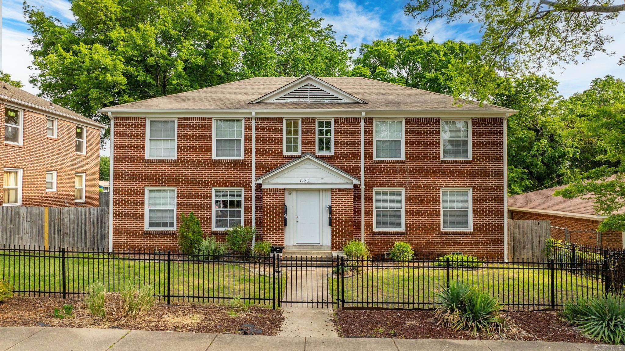 This charming fourplex has recently undergone significant upgrades and is poised for new tenants. The property features a mix of two-bedroom and one-bedroom units, each with updated kitchens and bathrooms, individual laundry facilities, and beautiful hardwood floors.