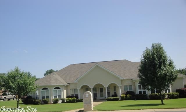 Prestige home in beautiful Quail Ridge Estates. Elegant 4 bedroom, 3 1/2 baths with gleaming cheery hardwood flooring, stunning kitchen with breakfast bar and granite countertops. Enjoy the open floor plan with arched entry to spacious living & dining, plus large windows with extensive wooden trim, master bedroom suite with fireplace, spacious bath and huge closet. Two fireplaces, zoned heat and air, triple car garage with work/storage areas, level landscaped fenced back yard with covered patio.