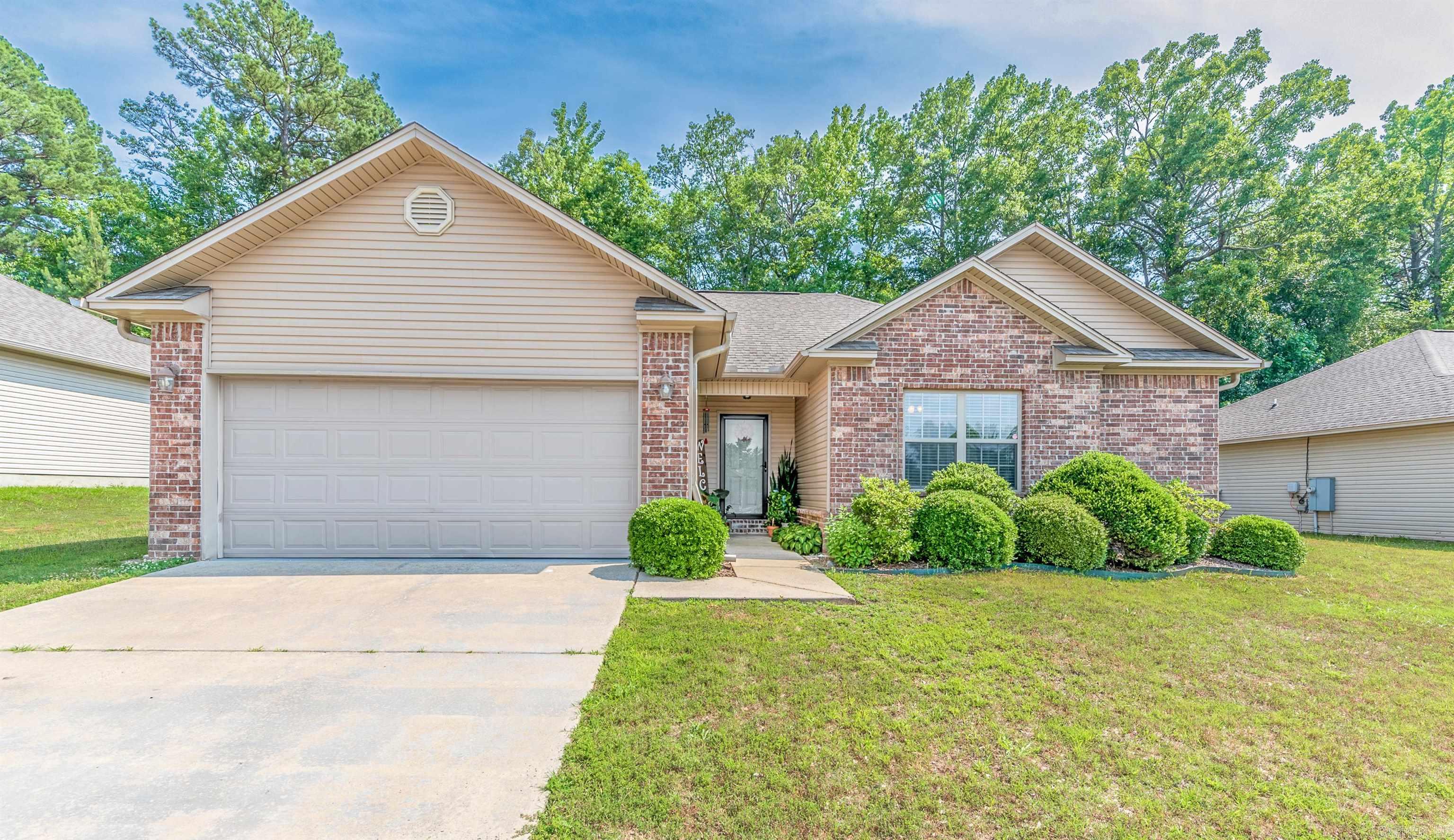 This well maintained beauty offers 3 bed, 2 baths and is ready for a new owner. All electric, fresh paint, new stove, energy efficient with a split floor plan! Semi open floor plan with a kitchen/dining combo that flows into the great room. Breakfast bar, spacious laundry room, eat-in-kitchen, newer dishwasher and disposal, large walk-in closet in master suite, carpet and tile throughout. Large backyard with privacy fence and patio with lots of privacy and green space behind the property! Home sits on a cul-de-sac and zoned for Bryant school district. Quick access to freeway makes the location idea. The rest you have to see. Don't miss this opportunity.