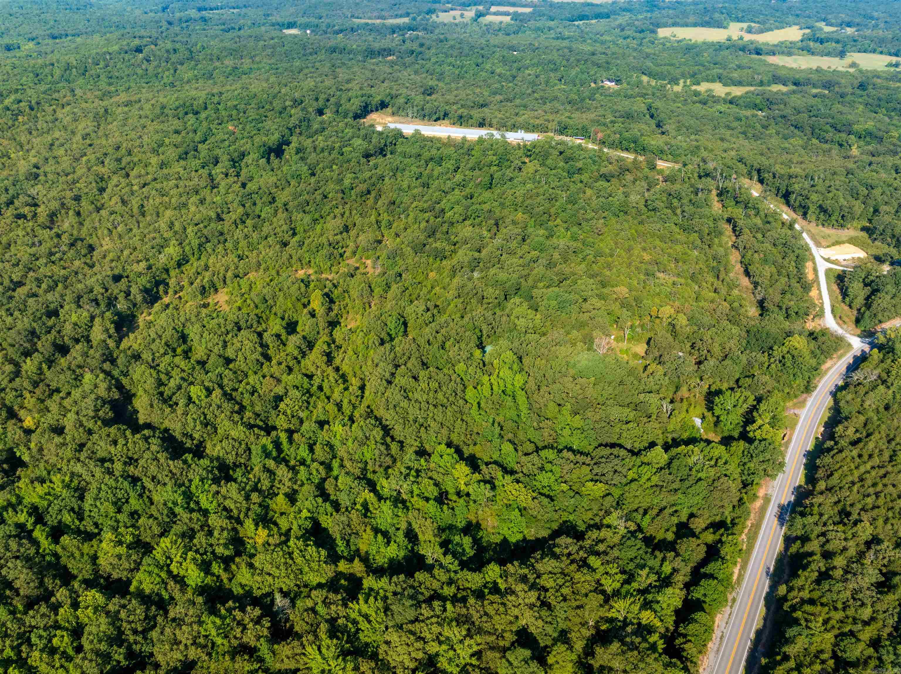8 +/- Acres in the Ozarks ā Hunting, Shop with Electricity, Water Access Available, Trails, and Future Homesite If youāve been searching for that perfect piece of land in the Ozarks, this 8 +/- acre property in Sharp County, Arkansas, may be just what youāve been looking for. Conveniently located only 15 minutes from Cave City and directly off Highway 115, this tract offers excellent access along with endless potential for recreation and a future homesite. A shop with electricity is already in place, making it a versatile structure that could easily be finished into a hunting cabin or weekend retreat. While water is not connected inside the shop, there is a water faucet out front (not currently hooked up), and Grange Calamine water runs along the road, making it simple to bring service directly to the property. The land itself is a hunterās paradise. With established food plots, wooded cover, and trails running throughout, the property is ready for outdoor enjoyment. White-tailed deer and wild turkey are abundant, offering excellent hunting opportunities. The rolling terrain, hardwood mix, and trail system make it easy to explore whether on foot or ATV.