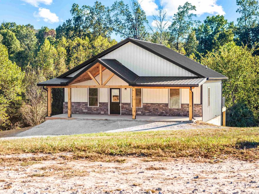 Modern 3-Bedroom Home with Walkout Basement on 1.09 Acres – Near Harrison, AR & Branson, MO Discover this newly built 3-bedroom, 2-bath home situated on 1.09 acres in a prime location between Harrison, Arkansas, and Branson, Missouri. The home features a covered front porch with a rich wood finish that creates a warm, inviting entrance. Inside, you’ll find quality construction, an open layout, and a full walkout basement—perfect for additional living space, storage, or storm protection. Enjoy peaceful country living while staying close to shopping, dining, and entertainment in both Harrison and Branson. Don’t miss the opportunity to own a beautiful new home in this convenient and desirable area.