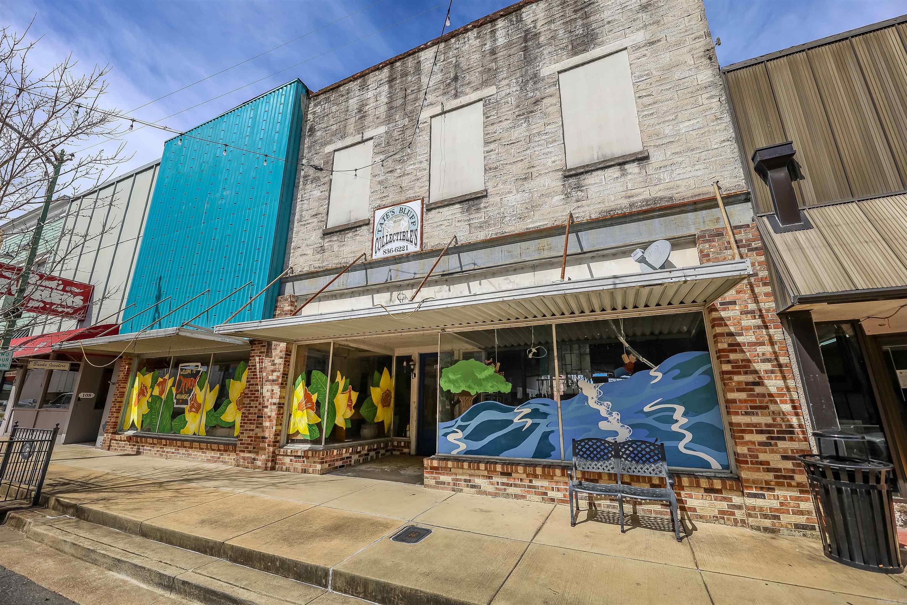 Prime commercial space in the heart of downtown! Bring your vision to life within the charm of the surrounding historic district, while opportunities abound to revitalize the property from the inside out. With over 10,000 ft.² spanning two stories, there is space to explore versatile retail endeavors, upper-level living quarters, and so much more. While this property does need renovation, it offers potential at a low price per square foot to give you a head start on your plans. **Inquire for more details on historic grants and resources available**